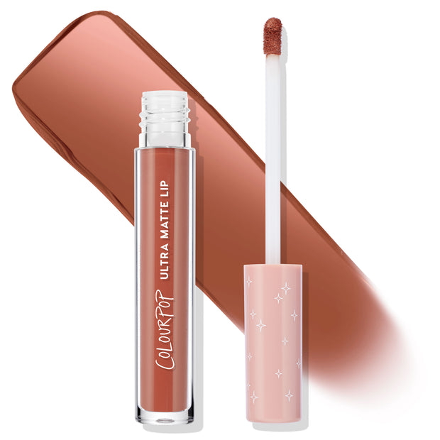 ColourPop Ultra Matte Lip in So Me, open tube with doe-foot applicator sweeping a matte warm terracotta-brown swatch; clear vial labeled Ultra Matte Lip and blush pink cap with white stars, set on a clean white background.