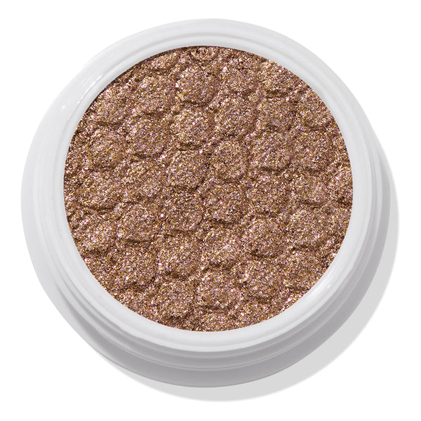ColourPop So Quiche Super Shock Shadow, a metallic olive‑taupe eyeshadow with pink and gold sparkle, catching light in its bouncy, dimpled pan inside a white twist pot, shown in a clean close-up on a white background.