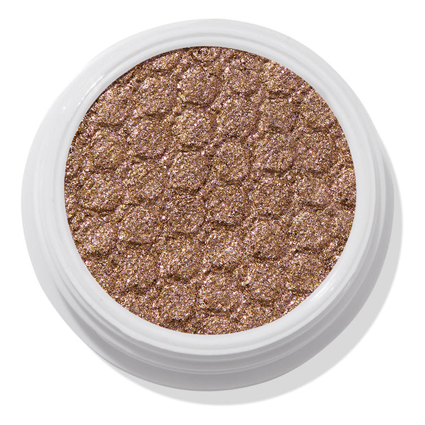 ColourPop So Quiche Super Shock Shadow, a metallic olive‑taupe eyeshadow with pink and gold sparkle, catching light in its bouncy, dimpled pan inside a white twist pot, shown in a clean close-up on a white background.