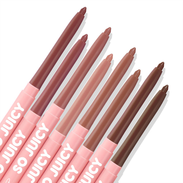Eight pink-barrel lip liners labeled SO JUICY arranged diagonally, tips exposed to show nude mauve-to-brown shades on a white flat lay; Juiciest Pout, the ColourPop So Juicy Plumping Lip Liner Set.