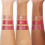 Temptation swatched on three forearms of different skin tones, the lowest glossy deep rose‑plum stripe, with nude Forbidden Love and bright Spice Level above, showcasing the high‑shine ColourPop So Juicy Plumping Gloss.