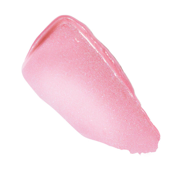 Shimmering baby-pink swatch of Girly Pop shows the high-shine, cushiony texture of the ColourPop So Juicy Plumping Gloss Balm with Peptides, smeared diagonally with fine microglitter on a clean white background.