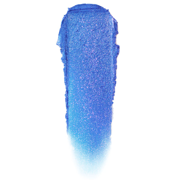 Shimmery cobalt-blue swatch of Stargaze, a ColourPop Jelly Much Shadow gel eyeshadow, with violet glitter flecks; thick vertical smear fading to a soft gradient on a white background.