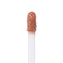Doe-foot wand saturated with Starling Ultra Blotted Lip in a peachy nude, standing upright against a white background; ColourPop Ultra Blotted Lip applicator shown in macro, highlighting the velvety, blotted texture.