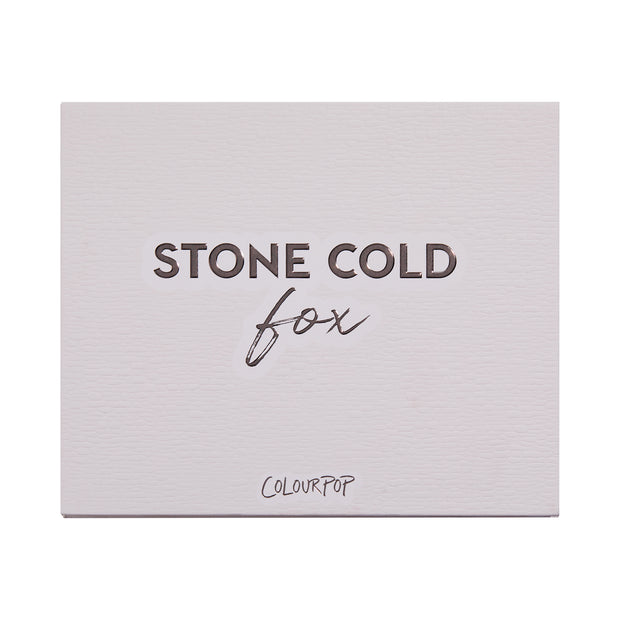 Stone Cold Fox shadow palette shown closed, featuring embossed “STONE COLD fox” lettering on a pale taupe faux-leather cover with ColourPop logo, studio-lit on a white background; a sleek neutral ColourPop Shadow Palette packaging shot.