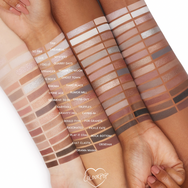 Stone Cold Fox ColourPop Shadow Palette swatches in cool neutrals - ivory, taupe, greige, mauve, silver, charcoal - displayed in neat rows across three arms of light, medium, and deep skin, with labeled shades highlighting matte and shimmer payoff.