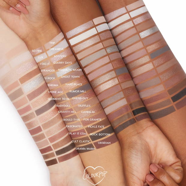 Stone Cold Fox ColourPop Shadow Palette swatches in cool neutrals - ivory, taupe, greige, mauve, silver, charcoal - displayed in neat rows across three arms of light, medium, and deep skin, with labeled shades highlighting matte and shimmer payoff.