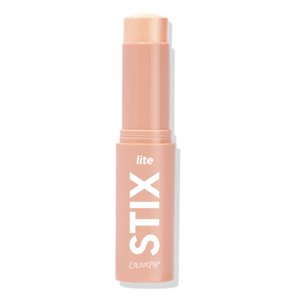ColourPop Lite Stix Sunlight highlighter - twist-up cream stick revealing a warm champagne shimmer - stands upright on a white background in a peach tube with bold white STIX lettering; quick swipe-on glow for cheeks, nose, and brow bone.