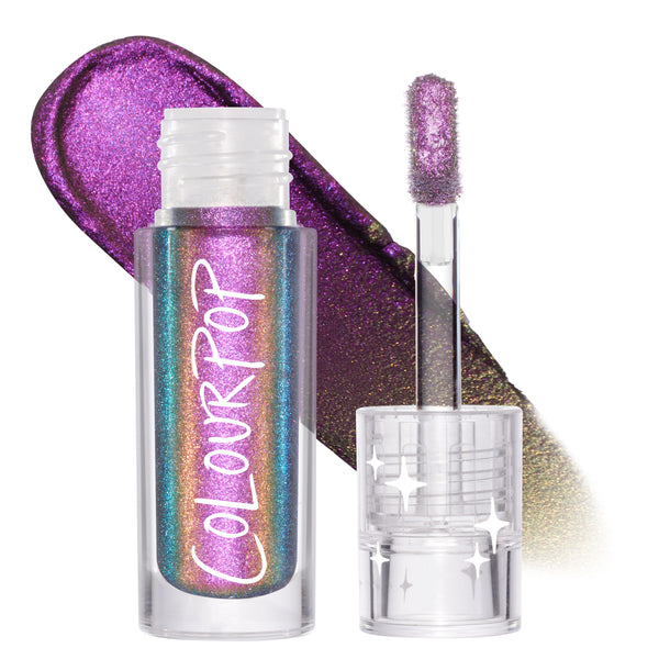 Supernova ColourPop Chrome Liquid Shadow shifts purple to teal to gold, shown in a clear tube with ColourPop logo and star-detailed cap, doe-foot applicator, and a shimmering multichrome swatch on a white studio background.
