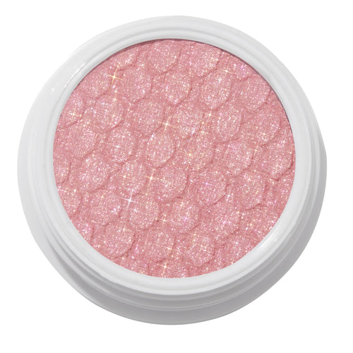ColourPop Sweet Tea Super Shock Shadow displaying a shimmering light pink, glittery finish with a bouncy scalloped texture, set in an open white pot against a clean white studio background.