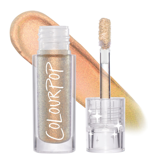 Sweetzer Ave ColourPop Chrome Liquid Shadow displaying a multichrome shift from peach and gold to green, with an open clear tube, white ColourPop logo, and doe-foot applicator beside a wide swatch on a white background.