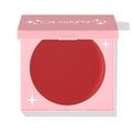 TTYL ColourPop Cream Blush in a half-closed pink compact, showcasing a large round pan of matte warm terracotta-red with star accents and the ColourPop logo on the lid, set against a white background.