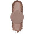 Round metal pan of ColourPop Take the Lead pressed powder shadow displays a cool taupe matte shade, centered on a vertical swatch of crushed pigment on a white background to show texture and payoff.