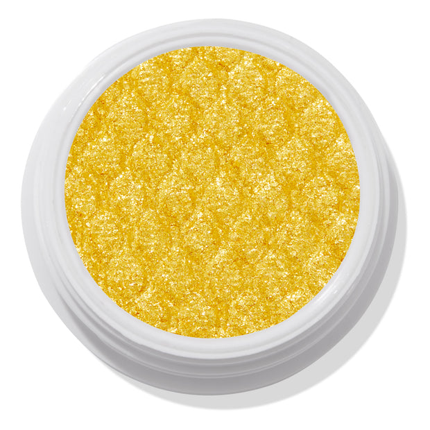 ColourPop Super Shock Shadow Tankini shows a vibrant metallic yellow‑gold pan sparkling with a quilted, bouncy texture, sitting open in a white jar against a clean white studio background.