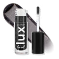 Team Jacob ColourPop Lux Lip Oil displayed open, doe-foot applicator beside the tube and a glossy charcoal-black swatch with silver shimmer behind, highlighting the sheer, high-shine finish; cap off on a white studio backdrop.