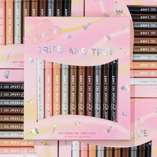 ColourPop Crème Gel Liner Tried and True vault displays 10 BFF crème gel liner pencils (10 x 0.2 g/0.01 oz) in a pastel pink cloud box with holographic stars, shades from cream and peach to browns and black, stacked against matching packaging.