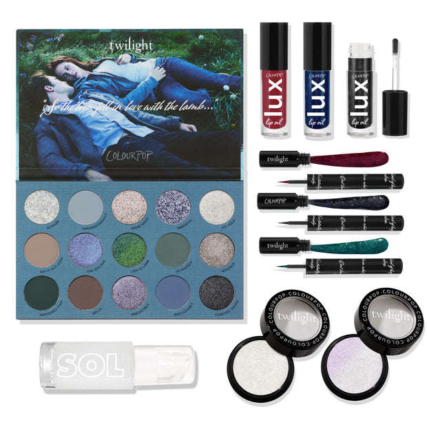 Twilight x ColourPop Full Collection set displays a 12-shade cool-toned eyeshadow palette with a movie-scene cover, three LUX lip oils (red, blue, black sparkle), four shimmery liquid liners, two Super Shock highlighters, and a SOL body glow; ColourPop makeup gift set.