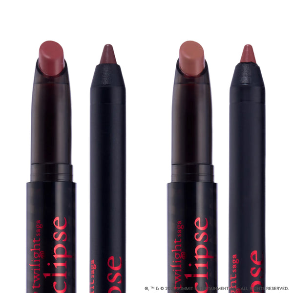 Immortal Kiss Lippie Stix Duo from the Twilight collection standing upright against a white background, showing two creamy mauve-brown lipstick crayons and two matching liners in sleek black tubes with red Eclipse branding.