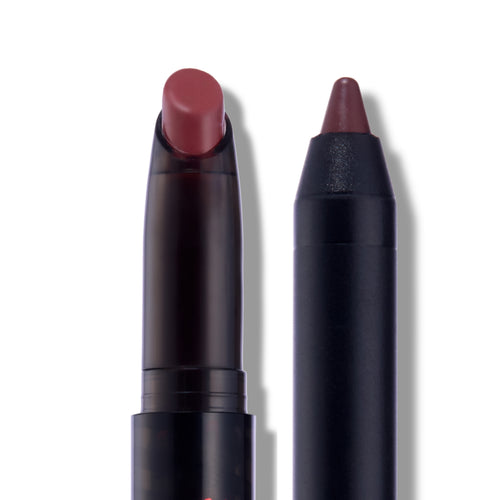New Love Lippie Stix from the Twilight collection shown uncapped in close-up, creamy rose-mauve lipstick bullet and matching crayon tip standing upright against a clean white background for detailed product view.