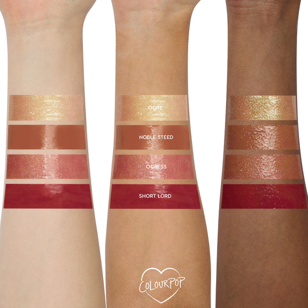Short Lord Ultra Glossy Lip swatched on three arms shows a high-shine deep red across light, medium, and deep skin tones; part of the ColourPop Ultra Glossy Lip lineup alongside Ogre, Noble Steed, and Ogress shades.