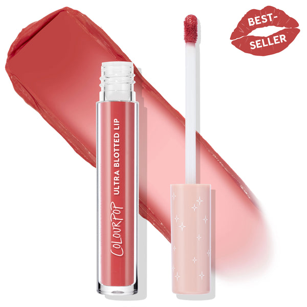 ColourPop Doozy Ultra Blotted Lip displayed open, doe-foot applicator coated in rosy terracotta, with a wide soft-matte swatch and a Best Seller lip badge; clear tube reads Ultra Blotted Lip with pink star cap on a white background.
