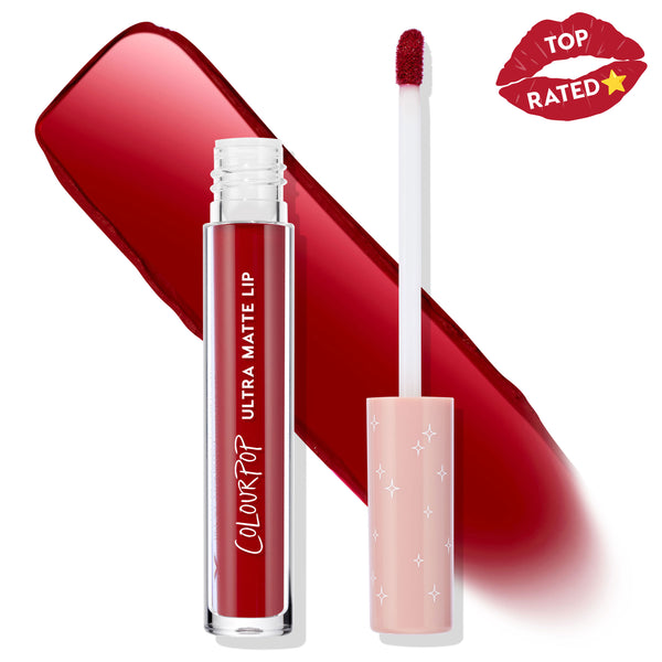 ColourPop Ultra Matte Lip in Melonade stands open with the doe-foot applicator swiping a rich deep red swatch, the clear tube labeled Ultra Matte Lip beside it, on a white backdrop with a Top Rated lip badge and blush cap with star accents.
