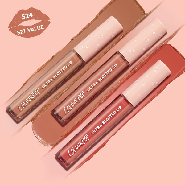 ColourPop Ultra Blotted Lip OG Babes trio showcasing three liquid lip tubes swept across a peach backdrop, with nude, warm pink, and terracotta swatches; blush‑pink caps with star details; value badge showing $24 and $27 value.