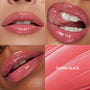 Close-up collage of three models’ lips wearing Guava Glaze So Juicy Plumping Gloss Balm with Peptides, showing shiny pink hydration and smooth texture beside a swatch of the glossy formula, promoting lip gloss & lip oil finish.