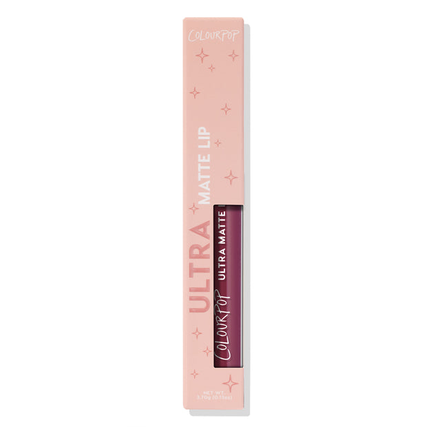 ColourPop Ultra Matte Lip in You Win stands upright in a blush-pink box with star accents, a cutout revealing the mauve liquid lipstick tube; 3.7g/0.13oz on a white background for a long-wear matte finish.
