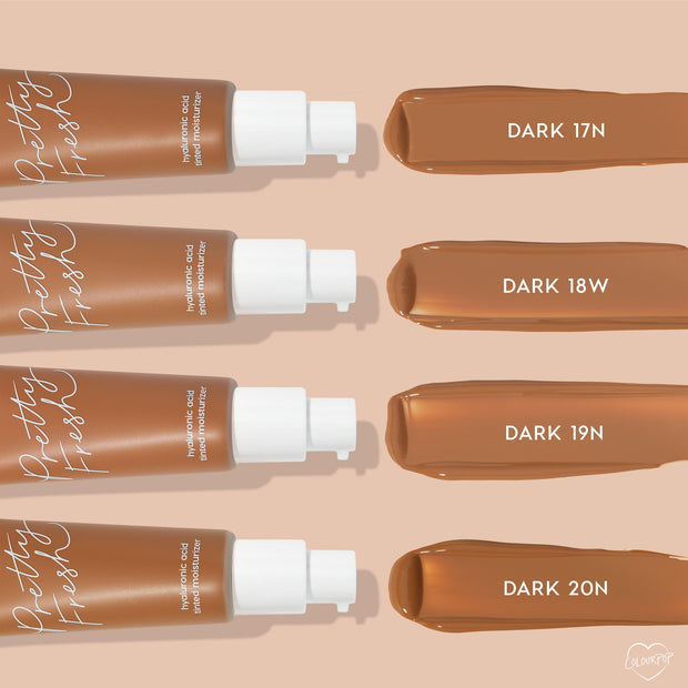 Dark 17 N swatch shown with pump bottle of Pretty Fresh Tinted Moisturizer, displayed beside Dark 18W, Dark 19N, and Dark 20N on a nude backdrop; ColourPop Pretty Fresh Tinted Moisturizer with hyaluronic acid for sheer, dewy coverage.