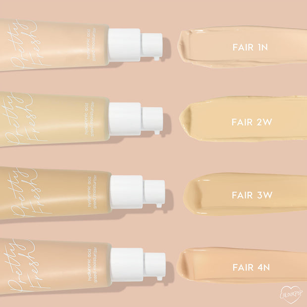 ColourPop Pretty Fresh Tinted Moisturizer, shade Fair 1 N, swatched as a light neutral beige, shown with pump bottles and comparison swatches labeled Fair 2W, Fair 3W, and Fair 4N on a nude backdrop; hydrating hyaluronic acid formula.