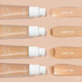 ColourPop Pretty Fresh Tinted Moisturizer Light 5N showcases a pump bottle and creamy neutral‑beige swatch, arranged beside Light 6W, Light 7W, and Light 8N on a peach background, highlighting the hyaluronic acid formula in white‑pump bottles.