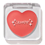 Heart-shaped Baby Bunny ColourPop Lip and Cheek Balm shown closed in a clear square compact, coral-pink tint with white sparkle graphics and ColourPop logo, displayed under studio light on a white background.