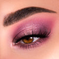 Close-up eye wears rose-mauve shimmer blended into a berry crease with inner-corner highlight and long black lashes, showcasing the Blush Crush Shadow Palette, a ColourPop Shadow Palette, for a soft romantic pink look.