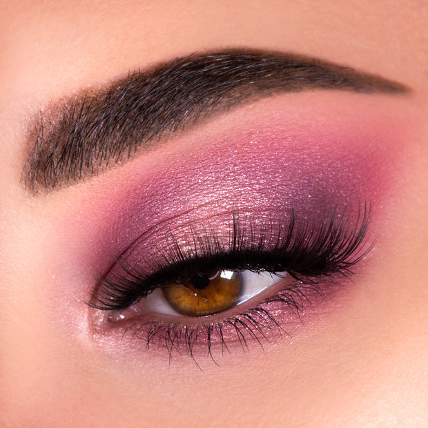 Close-up eye wears rose-mauve shimmer blended into a berry crease with inner-corner highlight and long black lashes, showcasing the Blush Crush Shadow Palette, a ColourPop Shadow Palette, for a soft romantic pink look.