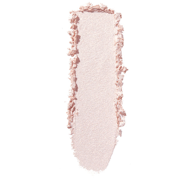 Swatch of Colourpop Mountain Lion Super Shock Shadow, a soft pale pink shimmer eyeshadow, brushed in a vertical streak with slightly crumbled edges on a clean white background.