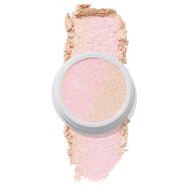 ColourPop Felicity Super Shock Highlighter displays a champagne, pink-shift shade in a white pot, the cream-to-powder formula catching light over a matching soft swatch on a clean white background.