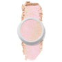 ColourPop Felicity Super Shock Highlighter displays a champagne, pink-shift shade in a white pot, the cream-to-powder formula catching light over a matching soft swatch on a clean white background.