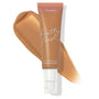 ColourPop Pretty Fresh Tinted Moisturizer tube in Medium Dark 13 W stands over a warm tan swatch, highlighting its hyaluronic acid, pump-top formula for sheer, dewy coverage on medium-dark warm skin tones against a white background.