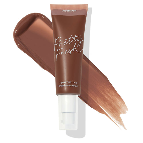 ColourPop Pretty Fresh Tinted Moisturizer tube in Deep Dark 22 N (neutral deep) with hyaluronic acid sits over a cocoa-brown swatch on white, highlighting the shade and pump-top packaging for lightweight, hydrating coverage.