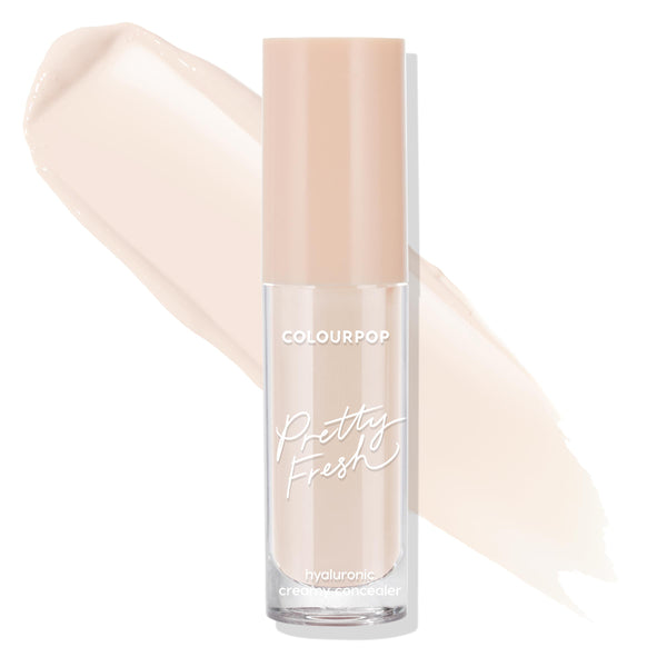 Fair 07 C tube of ColourPop Pretty Fresh Creamy Concealer standing upright with a blush-beige cap, showcasing its hyaluronic creamy formula in a clear bottle with pale fair swatches behind on a white background.