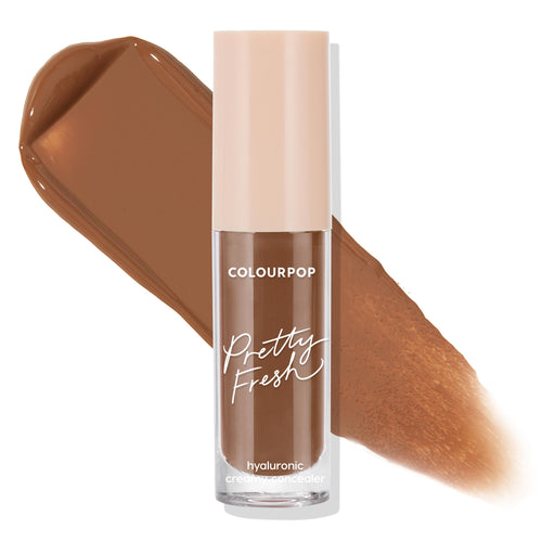 ColourPop Pretty Fresh Creamy Concealer in Deep Dark 190 W stands upright with a beige cap on a white background, showing a warm deep-brown swatch behind; hydrating hyaluronic formula with creamy, buildable coverage.