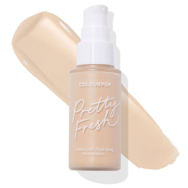 ColourPop Hyaluronic Hydrating Foundation (Pretty Fresh) bottle with white pump in shade Fair 25 W, shown upright over a light warm-beige swatch on a white background.