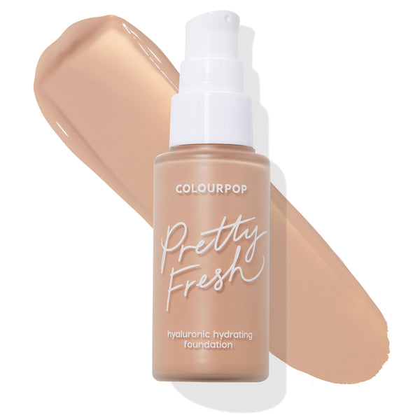 ColourPop Hyaluronic Hydrating Foundation bottle, shade Medium 85 N, standing upright with a white pump and Pretty Fresh label, shown beside a large neutral medium-beige swatch on a white background highlighting its hydrating formula.