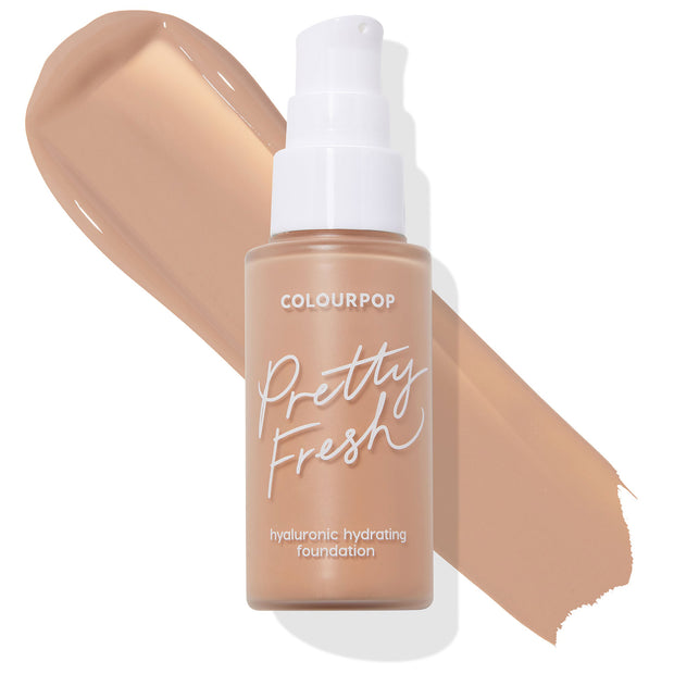 ColourPop Hyaluronic Hydrating Foundation Pretty Fresh bottle with white pump stands upright, showcasing the Medium 95 N neutral medium-tan shade in a wide swipe behind it on a clean white background.