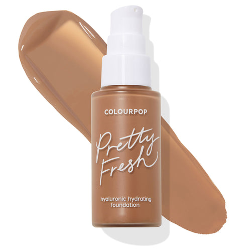 ColourPop Pretty Fresh Hyaluronic Hydrating Foundation bottle with white pump in shade Dark 175 W, placed over a smooth swatch of warm deep-brown tone, showcasing the ColourPop Hyaluronic Hydrating Foundation for deep complexions.
