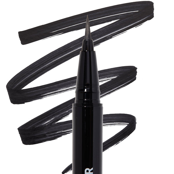 ColourPop BFF Liquid Liner in Black, brush-tip pen creating bold, opaque strokes, shown with a fine pointed tip making sweeping black swatches on a white background.