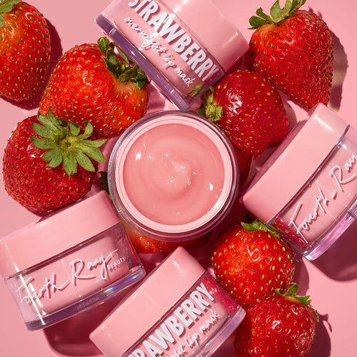 ColourPop Fourth Ray Beauty Strawberry Lip Mask, an open jar of creamy pink balm centered among four closed jars and fresh strawberries on a soft pink background, showcasing the overnight lip mask packaging and berry-inspired shade.