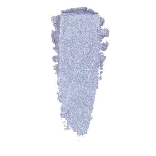Thick vertical smear of icy lilac eyeshadow with blue-silver shimmer and ragged edges on white, showcasing the finish of ColourPop Moon Daisy Super Shock Shadow.