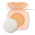 ColourPop Pretty Fresh Face Powder in Light 8 shown open, revealing the pressed powder pan and built-in mirror, with a round white sponge applicator beside the peach compact on a white background.